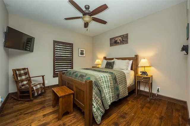 bedroom featuring ceiling fan and dark hardwood / wood-style floors