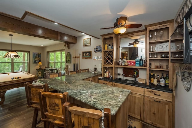 bar with ceiling fan, sink, pool table, dark hardwood / wood-style floors, and pendant lighting