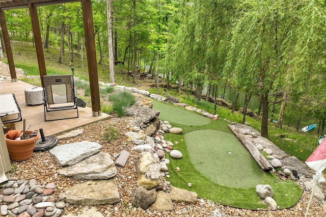 view of property's community featuring a patio area