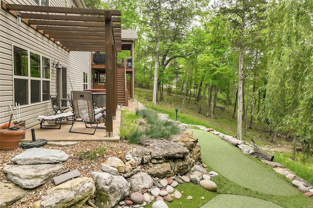 view of yard featuring a patio and a pergola