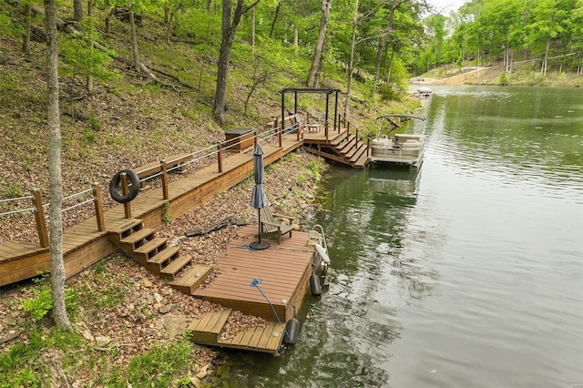 view of dock with a water view