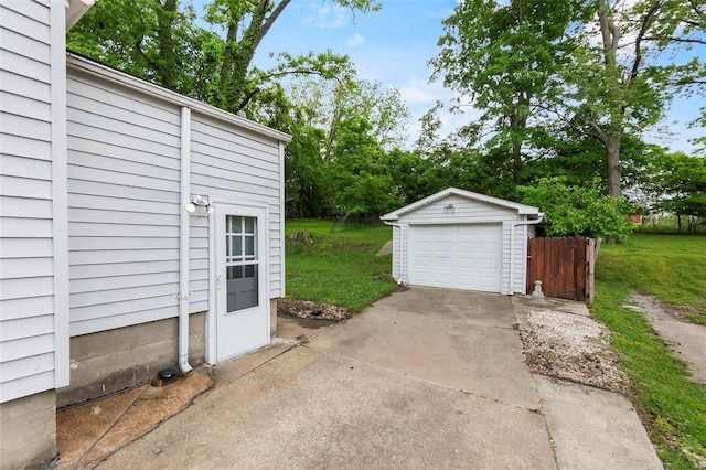 garage with a yard