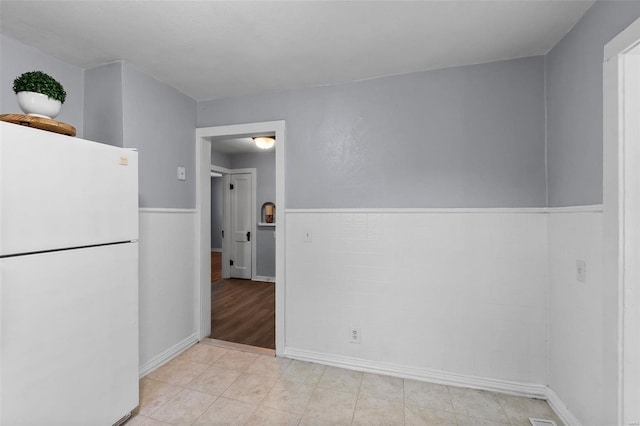 view of tiled spare room