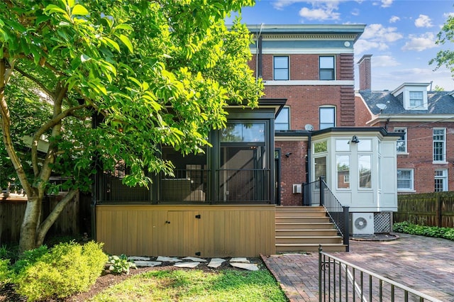 back of property with ac unit