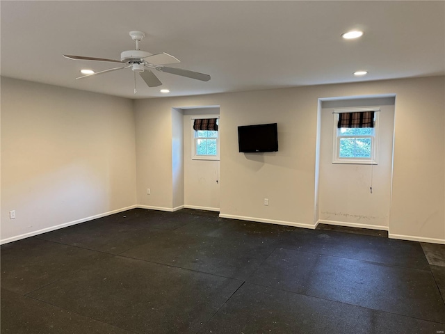 unfurnished room with ceiling fan