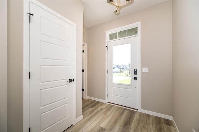 foyer with light wood-type flooring