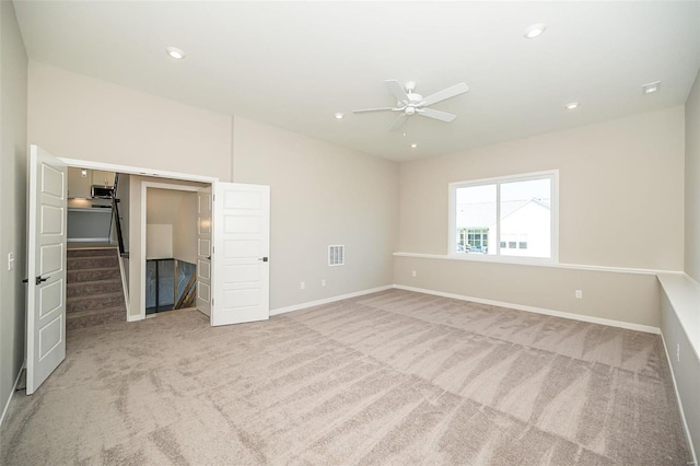 unfurnished bedroom with carpet and ceiling fan