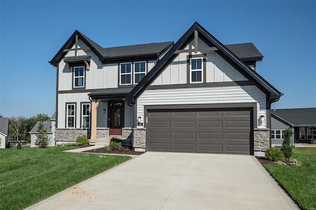 view of front of house featuring a garage and a front yard