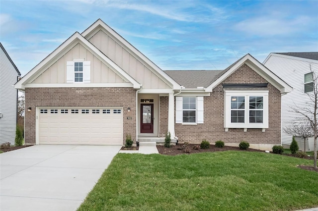 view of front of house with a front yard and a garage