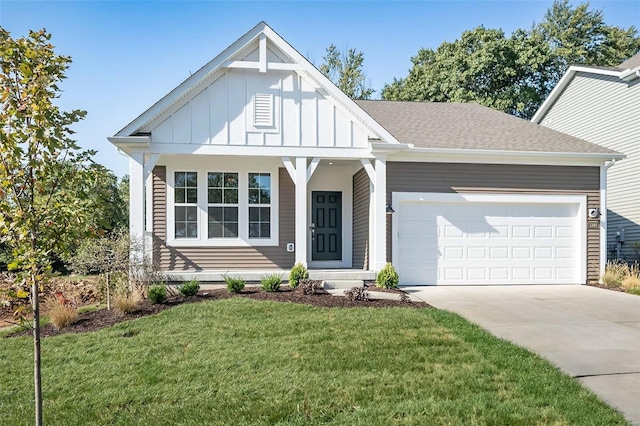 modern inspired farmhouse featuring a front lawn and a garage