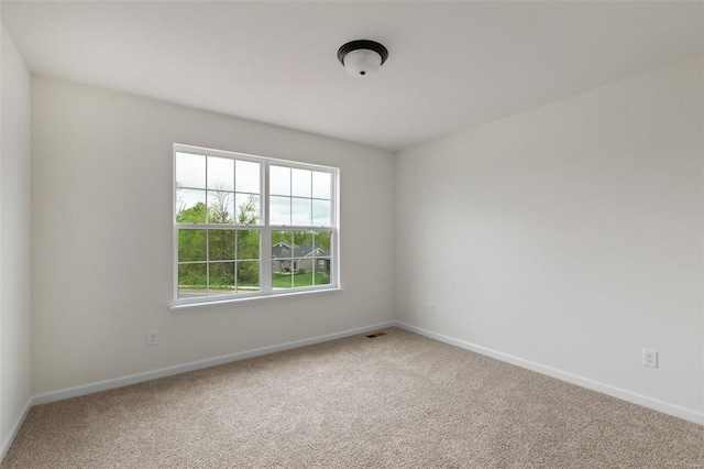 view of carpeted spare room