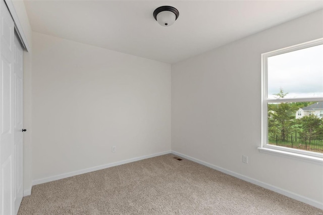 view of carpeted spare room