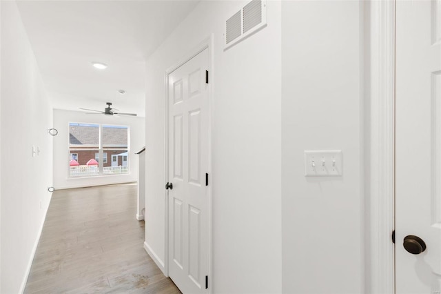 hallway featuring light wood-type flooring