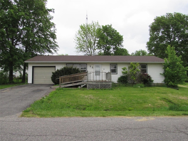 ranch-style house with a front lawn and a garage