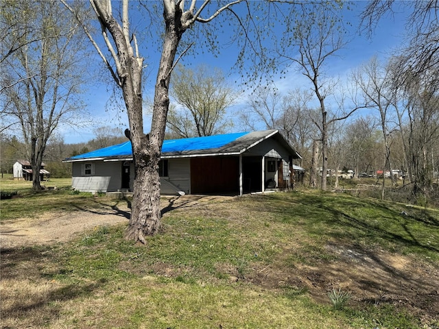 view of property exterior featuring a yard