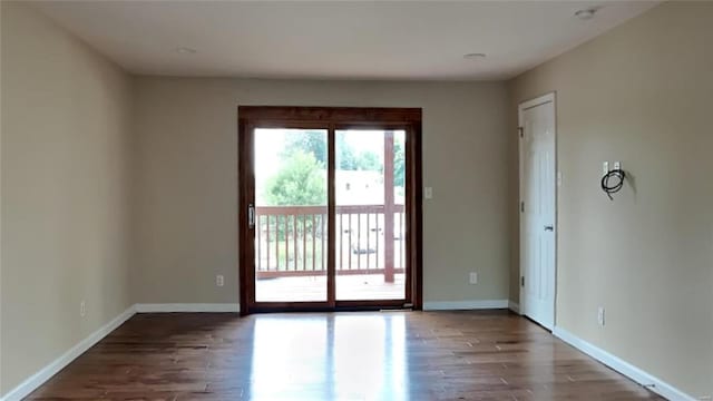 unfurnished room featuring wood-type flooring