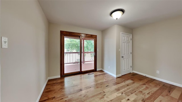 doorway to outside featuring light hardwood / wood-style flooring