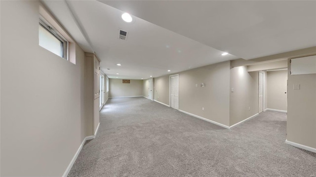 basement with light carpet