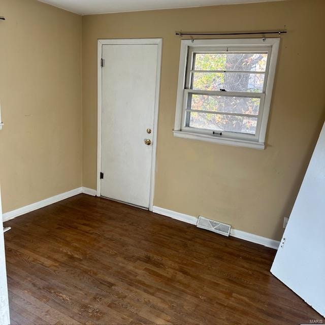 interior space featuring dark hardwood / wood-style flooring