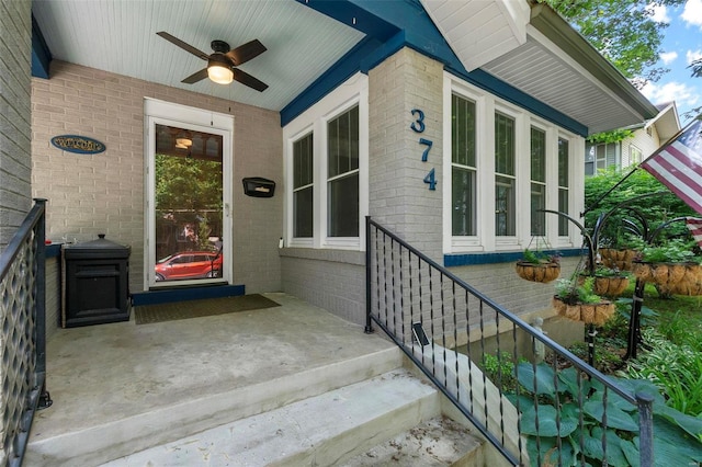 property entrance featuring ceiling fan