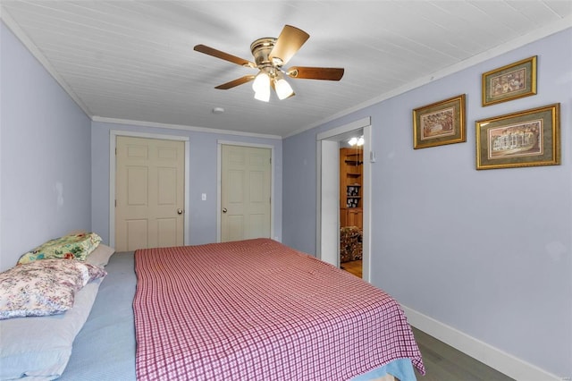 bedroom with wood-type flooring, ornamental molding, and ceiling fan