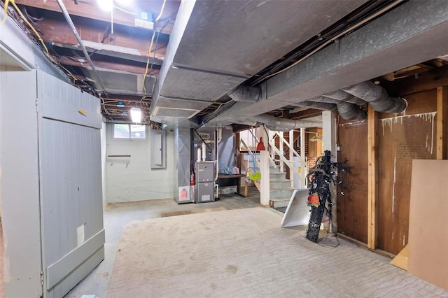 basement featuring heating utilities