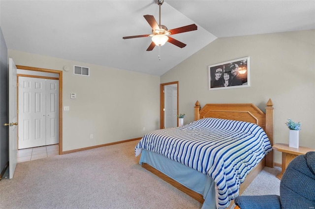 carpeted bedroom featuring ceiling fan and lofted ceiling