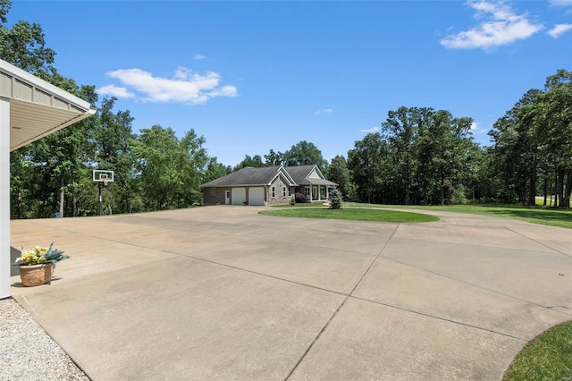 exterior space with a front yard and a garage