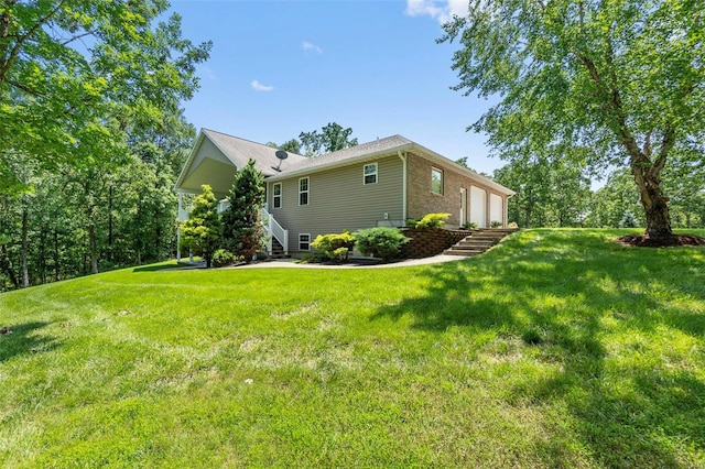 view of yard with a garage