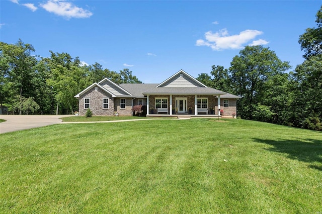 view of front of home with a front lawn and a porch