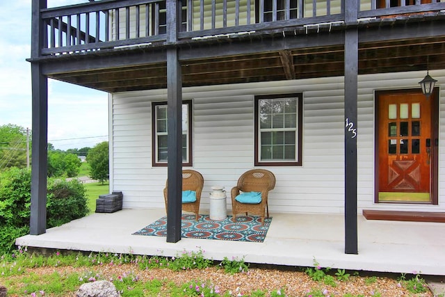 view of patio with a balcony