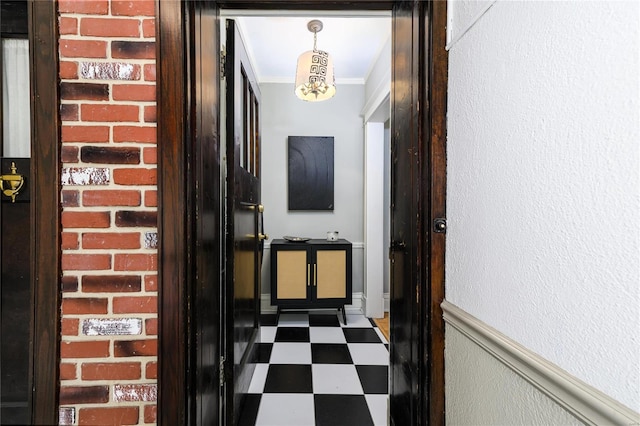 hallway with a chandelier