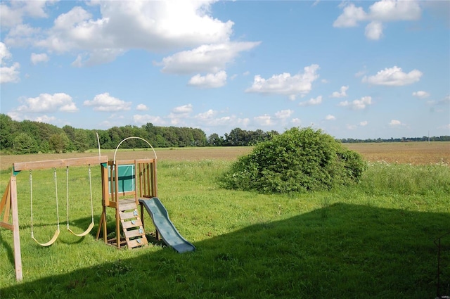 view of playground featuring a yard