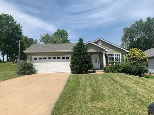 single story home with a garage and a front lawn