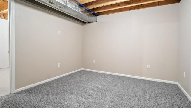 basement with carpet flooring