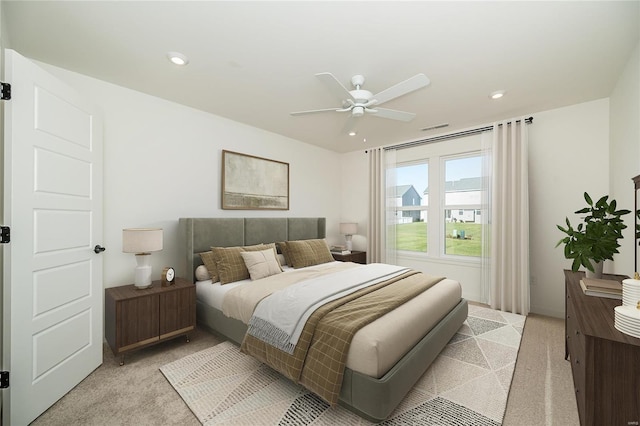 bedroom with light colored carpet and ceiling fan