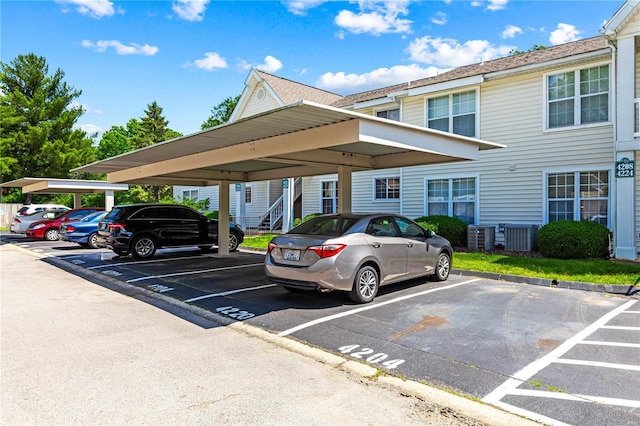 view of parking with a carport