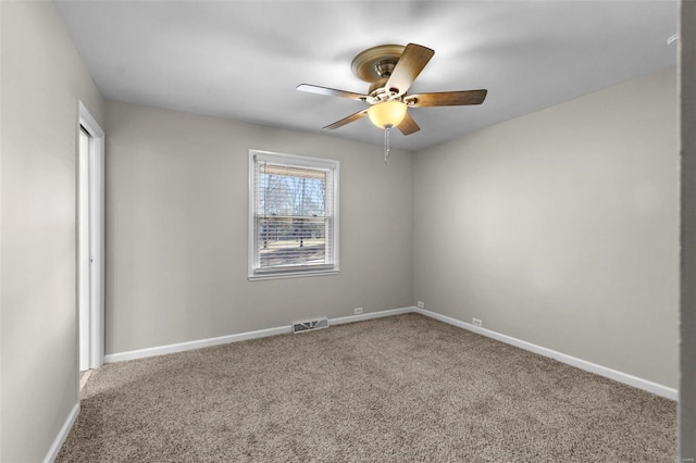 unfurnished room with carpet floors and ceiling fan