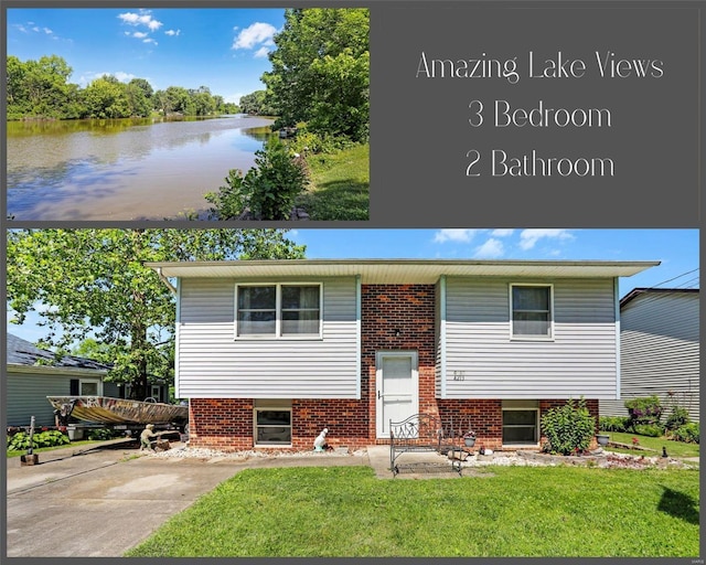 view of front of home featuring a water view and a front lawn