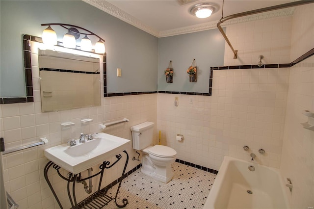 full bathroom with sink, tile walls, ornamental molding, toilet, and tile patterned floors