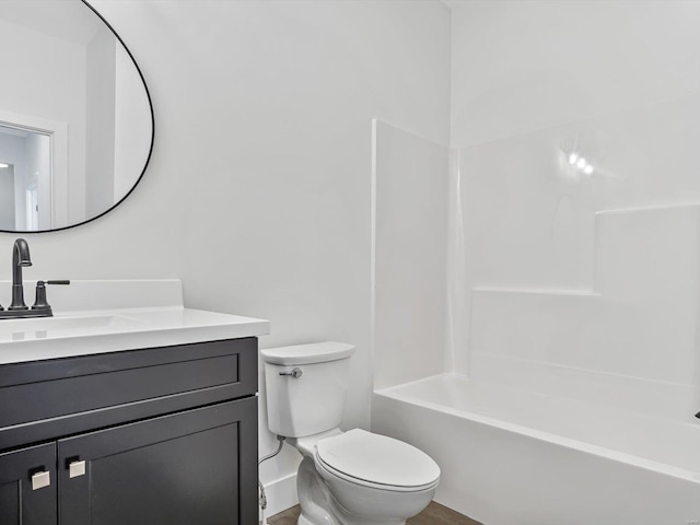 full bathroom featuring shower / bath combination, vanity, wood-type flooring, and toilet