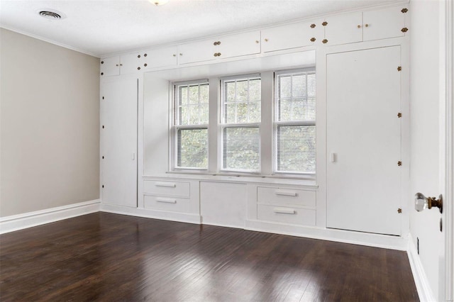 empty room featuring hardwood / wood-style floors