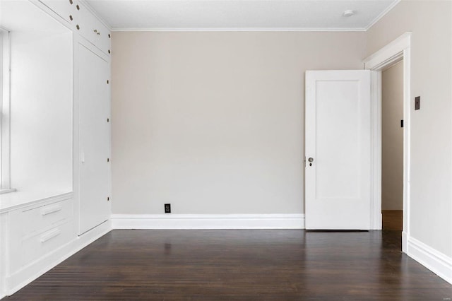 unfurnished room featuring crown molding and hardwood / wood-style flooring