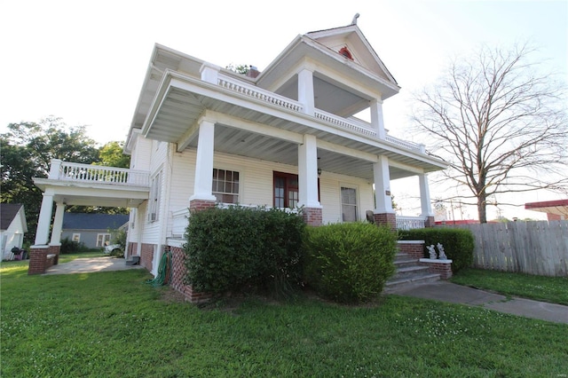 view of front facade with a porch and a front yard