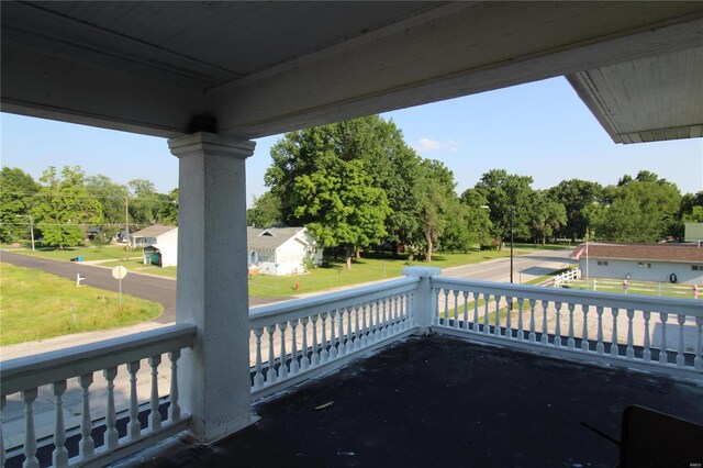 deck featuring a lawn