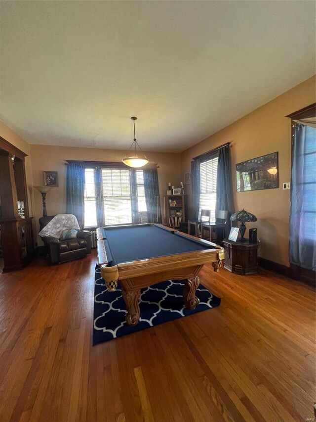 recreation room featuring pool table and hardwood / wood-style flooring