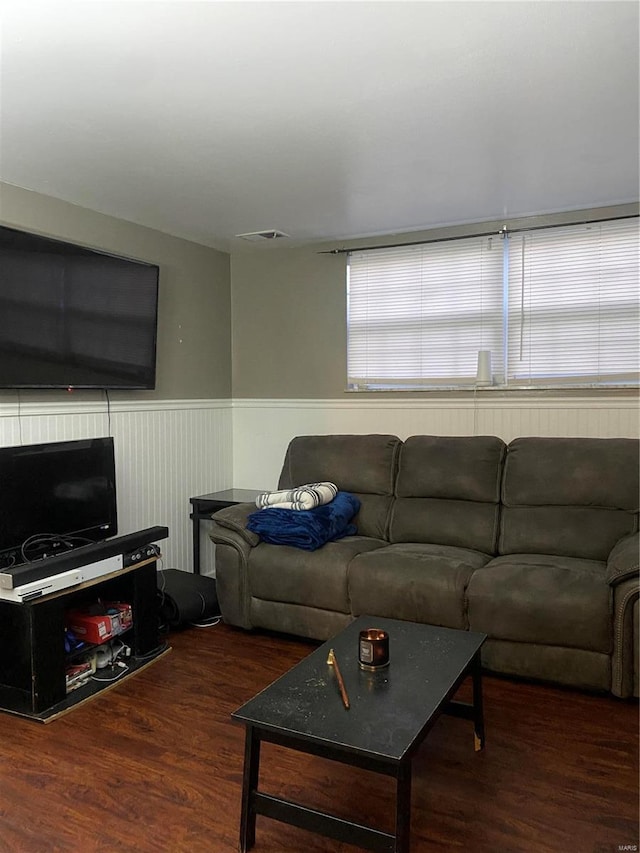 living room featuring dark hardwood / wood-style flooring