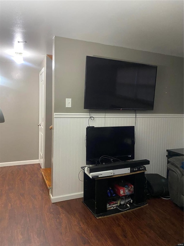 living room with dark hardwood / wood-style flooring