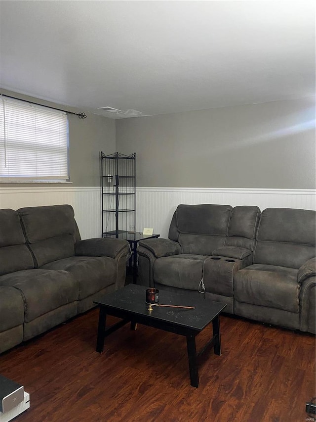 living room with dark hardwood / wood-style floors