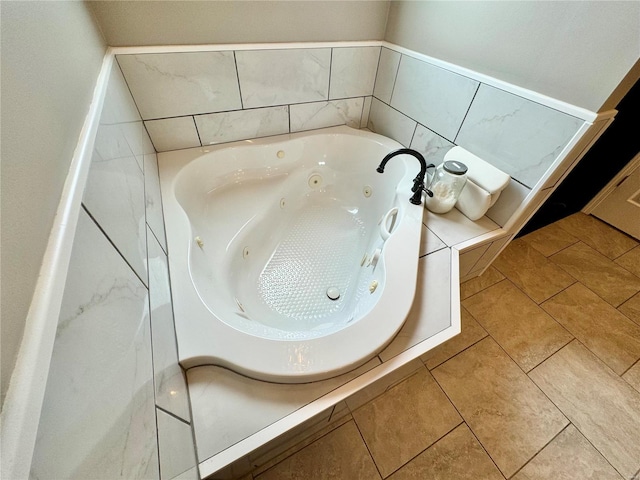 bathroom with tiled tub